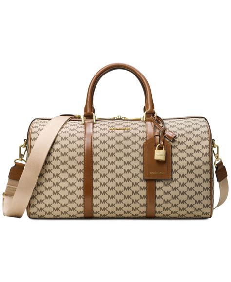 michael kors gold weekender bag|michael kors trolley suitcase.